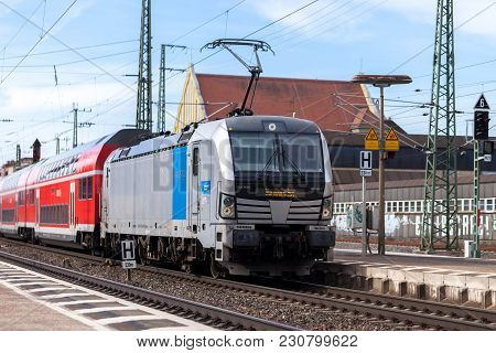 Fuerth / Germany - March 11, 2018: Re Regional Express Train From Deutsche Bahn Passes Train Station