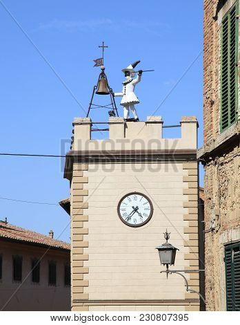 View On The Historic Pulcinella Tower With Clock In Montepulciano, Tuscany, Italy