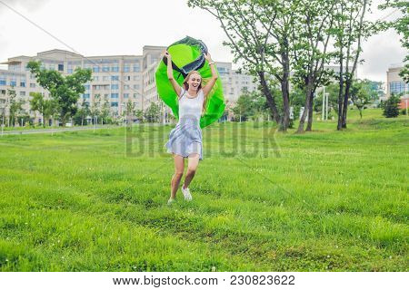 A Woman Tries To Inflate An Air Sofa. Lamzac