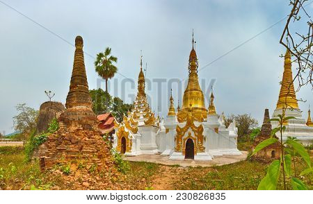 Buddhist temple Sankar. Stupa on the foreground. Shan state. Myanmar. 