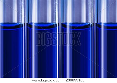 Blue Liquid In Tubes On Medical Background