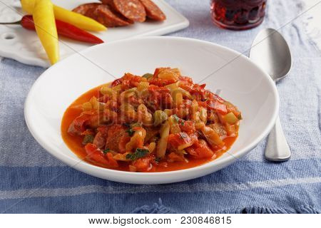 Lecso with spiced sausage and hot pepper