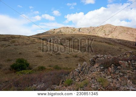 Autumn On The Ku Mountain Range. A Mountain Range Is A Series Of Mountains Or Hills Ranged In A Line