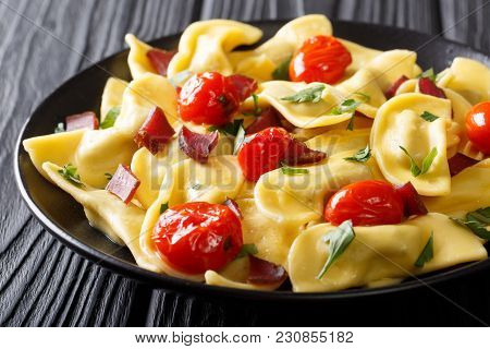 Homemade Dumplings Stuffed With Ham, Cherry Tomatoes And Fresh Herbs Close Up On A Plate On The Tabl
