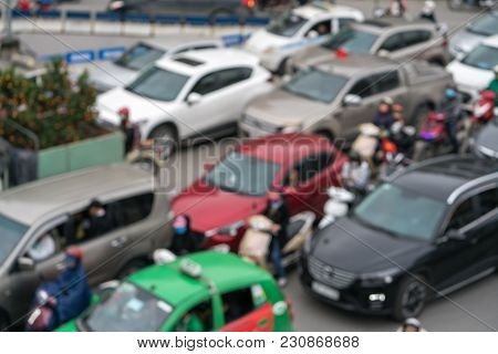 Aerial Blurred Image Of Traffic Jam In City. Urban Infrastructure Problem.