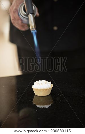 Tattletale With Lemon Curd And Meringue On Black
