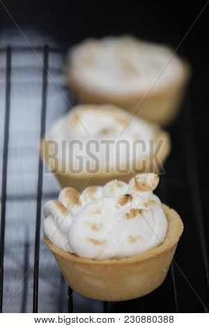 Tattletale With Lemon Curd And Meringue On Black