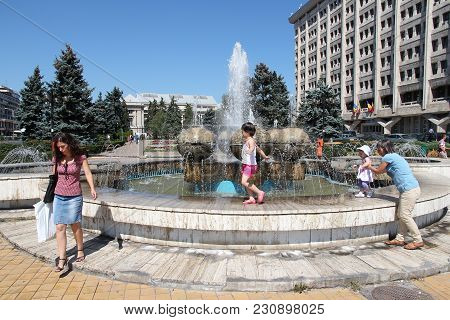 Ploiesti, Romania - August 20, 2012: People Visit City Park In Ploiesti, Romania. Ploiesti Is The 9t