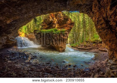 Johnston Creek Photographed From A Cave. Johnston Creek Is A Tributary Of The Bow River In Banff Nat