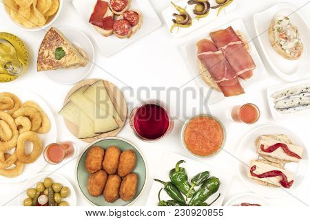 An Overhead Photo Of A Collection Of Spanish Tapas Food, Shot From Above On A White Background, Form
