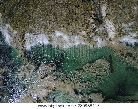 Diving In Cascade Of Pristine Waters In A Chilean River