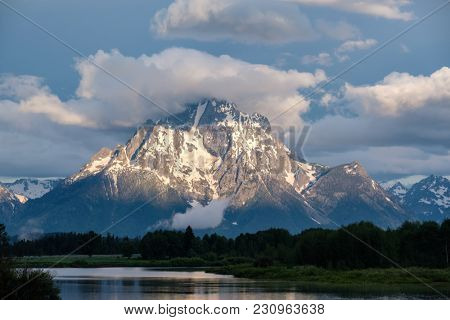 Grand Teton Mountains from Oxbow Bend on the Snake River at morning. Grand Teton National Park, Wyoming, USA.