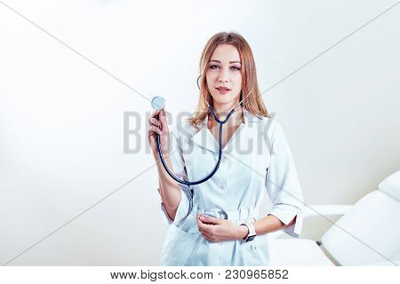 Emale Doctor On Duty Welcoming Patient At The Hospital, Friendly Professional, Healthcare