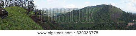Panorama Over The Green Lush Tea Plantations In Munnar, India