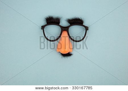Funny Mask With Eyes And Nose On Light Blue Background