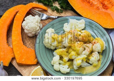 Steamed Cauliflower With Cheese Sauce And Pumpkin