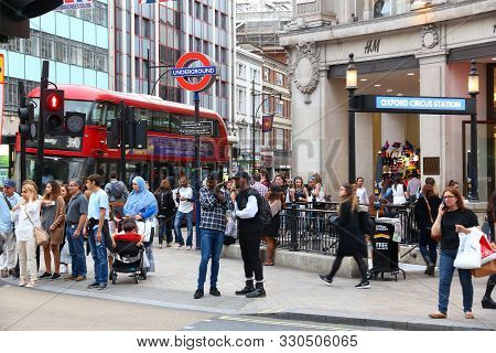 London, Uk - July 6, 2016: People Shop At Oxford Circus, Oxford Street In London. Oxford Street Has 