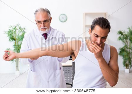 Young male patient visiting experienced doctor