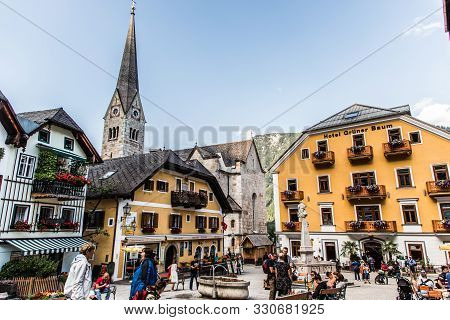 Hallstadt, Austria - July, 2019: Beautiful Houses Of Hallstadt, Austria. Tourist Destinations.