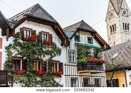 Hallstadt, Austria - July, 2019: Beautiful Houses Of Hallstadt, Austria. Tourist Destinations.