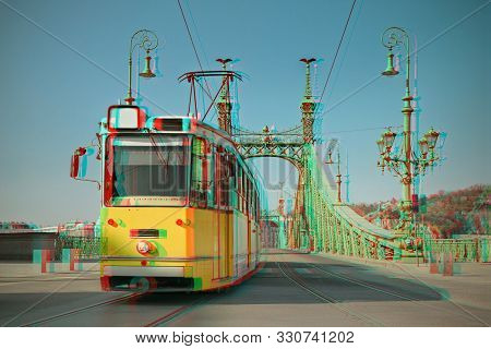 Historic Tram On Freedom Bridge In Budapest, Hungary, On A Bright Day, Toned Image, 3d Anaglyph Effe