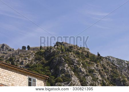 An Old Fortress On Top Of A Mountain