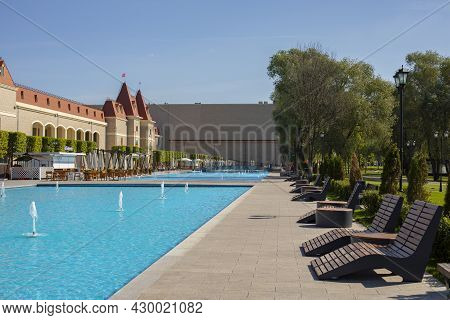 Moscow, Russia - August 15, 2021: Dream Island Amusement Park. A Fountain Imitating A Pool, A Relaxa