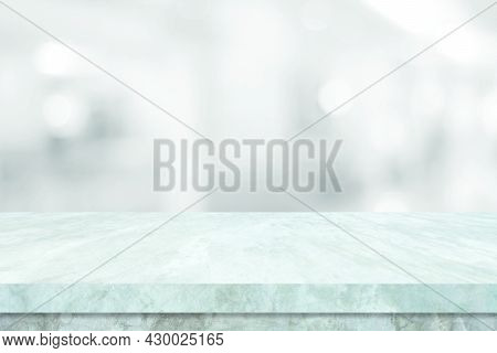 Empty White Table Top, Counter, Desk Over Blur Perspective Store With Bokeh Light Background, White 