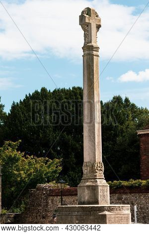 Winchester, United Kingdom, 10th August 2021:- A Stone Cross Outside Winchester Cathedral