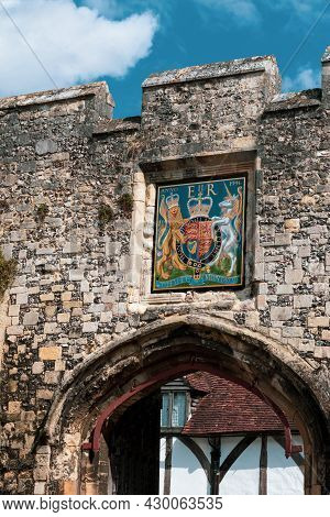 Winchester, United Kingdom, 10th August 2021:- A Royal Coat Of Arms Above A Gate In Winchester City 