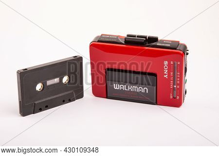 Huettenberg, Germany - 2021-04-07: Beautiful Red Vintage Sony Walkman Wm-24 With Black Audio Cassett
