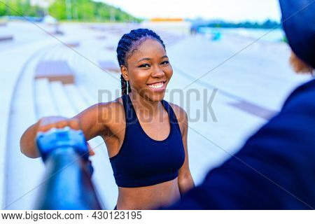Spain Woman With Afro Pigtails Crossfit Trainer Motivating Her Boyfriend For Morning Running Outdoor