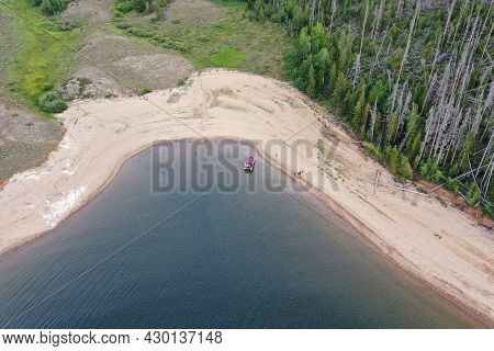 Aerial View Of Family And Friends Enjoying Afternoon Boating On Lake Granby In Arapaho National Recr