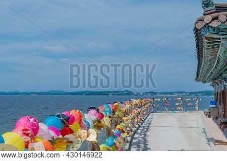 Paper Lanterns Tied To Railing At Seaside Templ.
