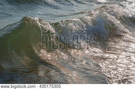 Colored Sea Waves With Splashes And White Breakers In Circeo Park, Sabaudia, Italy