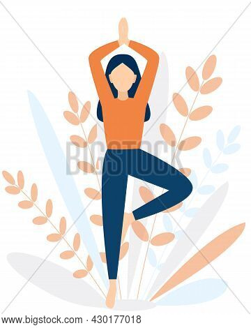 An Adult Girl Is Doing Yoga Outdoors. Osana Tree Pose. The Woman Keeps Balance On One Leg. Healthy L