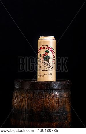 Can Of Birra Moretti Beer On Wooden Barrel With Dark Background. Illustrative Editorial Photo Buchar