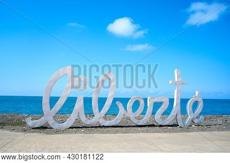 Art Object On The City Embankment Of Batumi. White Letters Inscription Liberte. Batumi, Georgia - 03