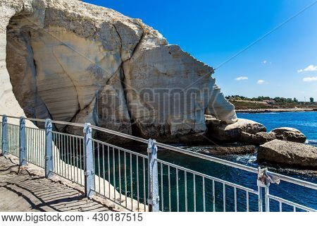 Hiking trail laid inside cave. Grottoes Rosh - ha - Nikra - geological formation in northern Israel, on the border with Lebanon. The concept of active, eco and photo tourism
