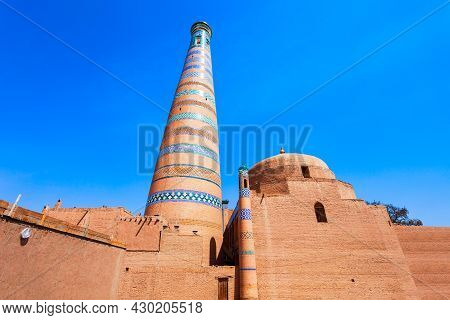 Islam Khodja Minaret At The Itchan Kala, The Walled Inner Town Of The City Of Khiva In Uzbekistan