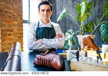 Hobby Became A Small Business Leather Man In Apron Is Making A Leather Wallet And Shooes In Studio