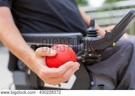 Disabled Boccia Player Playing On A Wheelchair