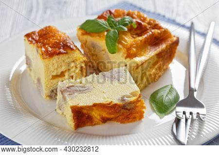 Chicken Breast And Egg Bake, Chicken Meat Omelette On A White Plate With Silver Fork And Knife On A 