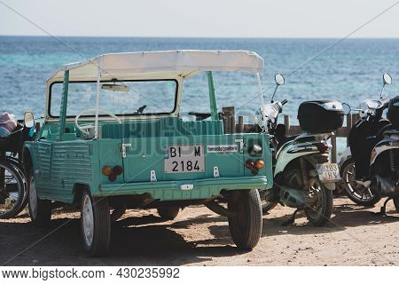 Formentera, Spain: 2021 August 17: Retro Citroen Mehari In Light Blue And White On Mijorn Beach In F