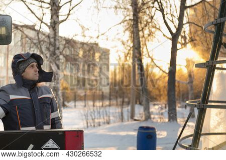 Portrait Of A Hydraulic Crane Operating Worker