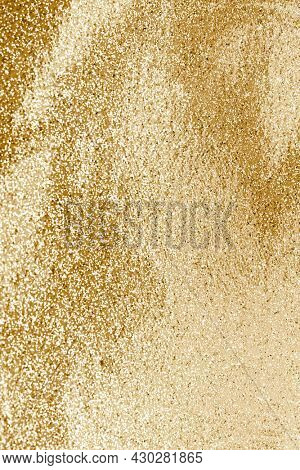 Gold glitter textured background and wallpaper