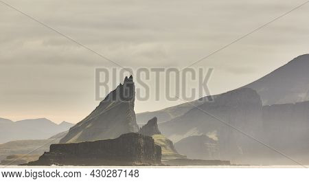 Faroe Islands Sunset Dramatic Coastline Landscape In Vagar Island. Seascape