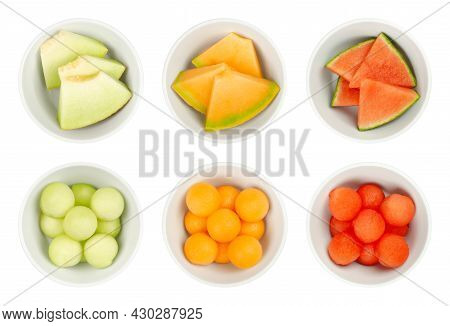 Melon Slices And Balls In White Bowls. Galia, Honey Cantaloupe Melon And Watermelon, Freshly Cut Out