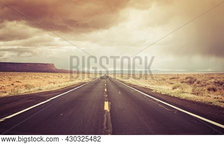 A Straight Road To The Distant Horizon Across The Desert Of Northern Arizona With The Vermillion Cli