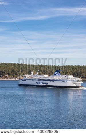 Victoria, Vancouver Island, British Columbia, Canada - August 10, 2021: Bc Ferries Boat Leaving To T